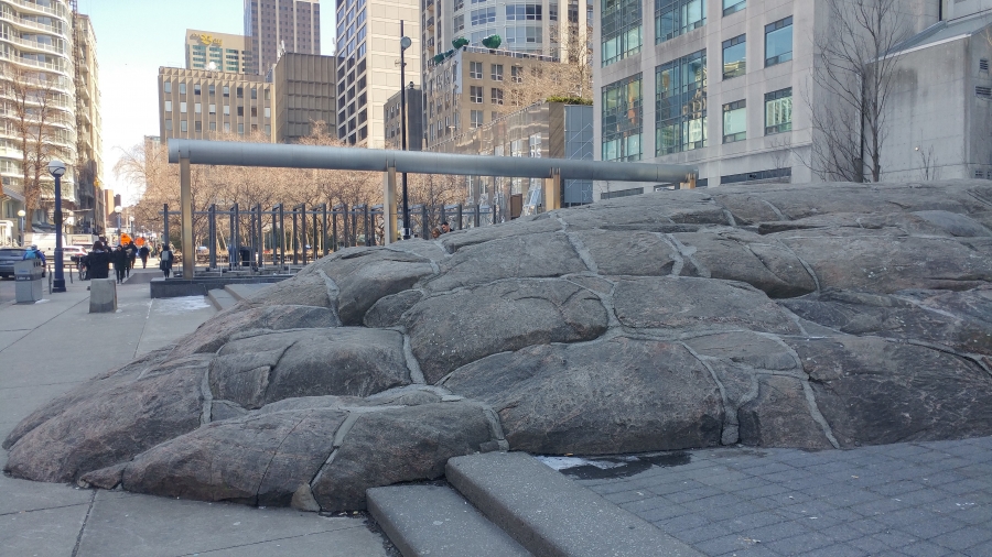 The Muskoka granite outrcop, one of the features of the Village of Yorkville Park (April 2019)