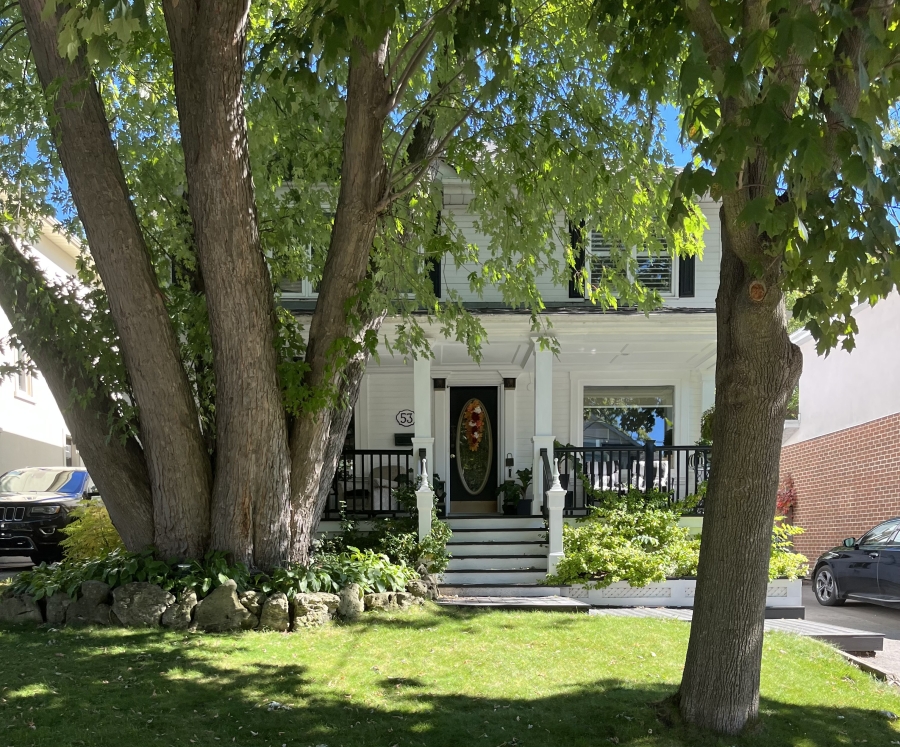 House was renovated from a Victory Style home between 1973-1975 to this suburban home with Plantation-style characteristics.